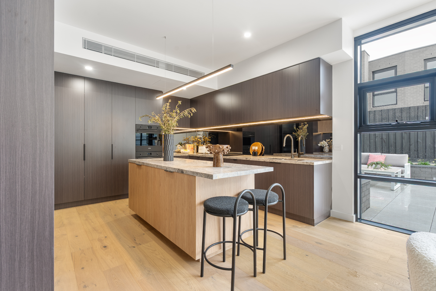 Where design meets everyday living. The kitchen is at the heart of every home, and this space at our completed Caulfield Townhouse…